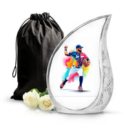 Pure White Baseball Cremation Urn front view showing detailed design - flowing teardrop baseball silhouette on curved aluminum - full-size 10 inch 200 cubic inch adult cremation urn