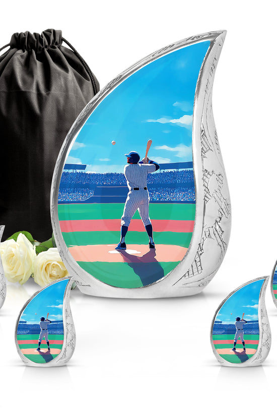 Azure Baseball Cremation Urn side profile showing urn shape - flowing teardrop baseball silhouette on curved aluminum - memorial set with one large and four small urns