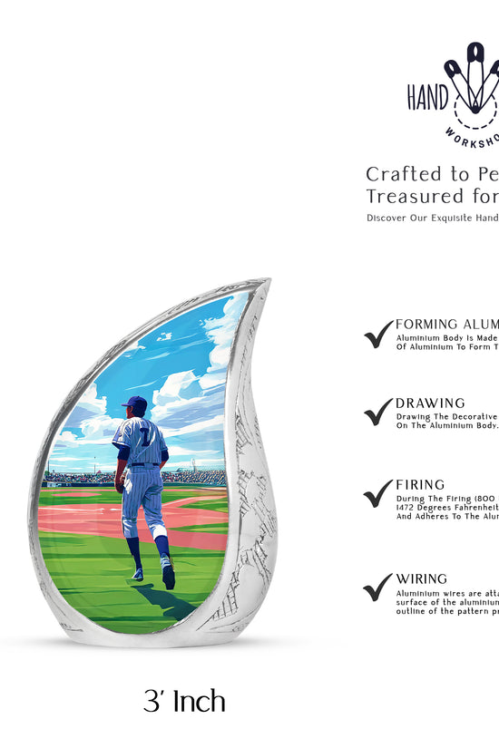 Soft Blue Baseball Cremation Urn angled view of lid and engraved motif - graceful tear-shaped urn with baseball motif - mini keepsake memorial for portion of cremation ashes