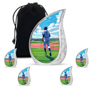Dusty Blue Baseball Cremation Urn side profile showing urn shape - rounded teardrop baseball design with delicate detail - memorial set with one large and four small urns