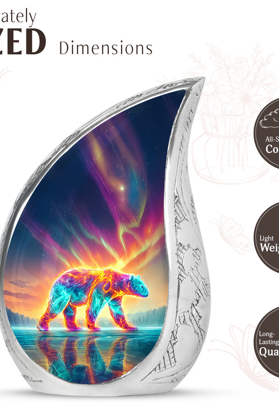 Soft Blue Bear Cremation Urn angled view of lid and engraved motif - smooth teardrop contour featuring bear art - mini keepsake memorial for portion of cremation ashes