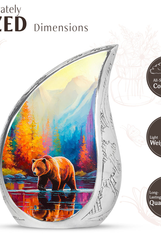 Icy Blue Bear Cremation Urn angled view of lid and engraved motif - rounded teardrop bear design with delicate detail - mini keepsake memorial for portion of cremation ashes