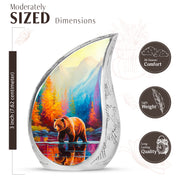 Icy Blue Bear Cremation Urn angled view of lid and engraved motif - rounded teardrop bear design with delicate detail - mini keepsake memorial for portion of cremation ashes