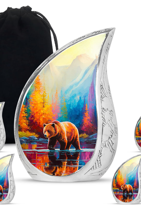 Cobalt Blue Bear Cremation Urn side profile showing urn shape - graceful tear-shaped urn with bear motif - memorial set with one large and four small urns