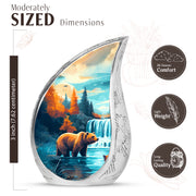 Sea Green Teal Bear Cremation Urn angled view of lid and engraved motif - flowing teardrop bear silhouette on curved aluminum - mini keepsake memorial for portion of cremation ashes