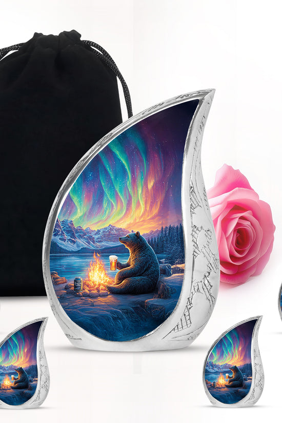 Cobalt Blue Bear Cremation Urn side profile showing urn shape - smooth teardrop contour featuring bear art - memorial set with one large and four small urns