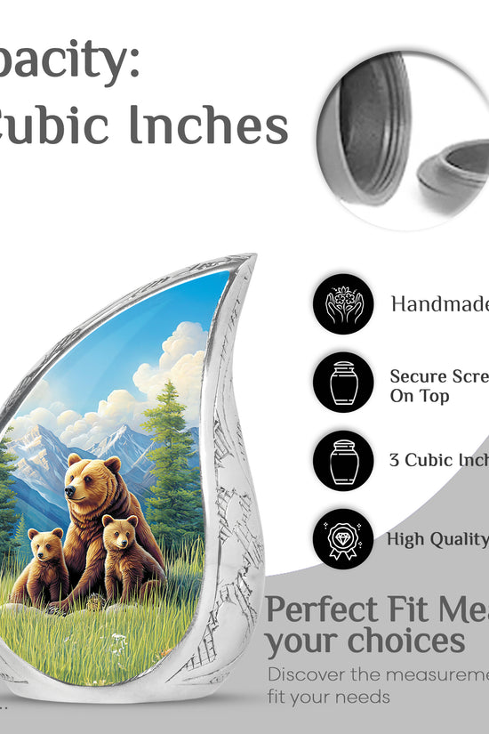 Soft Blue Bear Cremation Urn angled view of lid and engraved motif - smooth teardrop contour featuring bear art - mini keepsake memorial for portion of cremation ashes
