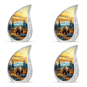 Amber Gold Bear Cremation Urn close-up of engraving and surface detail - flowing teardrop bear silhouette on curved aluminum - 10 inch aluminum urn for cremated remains