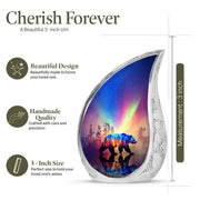 Misty Blue Bear Cremation Urn angled view of lid and engraved motif - flowing teardrop bear silhouette on curved aluminum - mini keepsake memorial for portion of cremation ashes