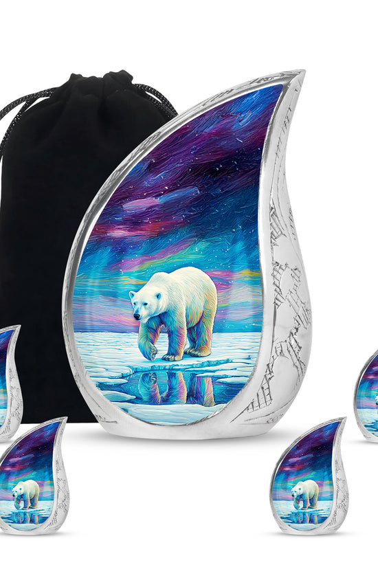 Pastel Blue Bear Cremation Urn side profile showing urn shape - flowing teardrop bear silhouette on curved aluminum - memorial set with one large and four small urns
