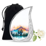 Gleaming Silver Bear Cremation Urn front view showing detailed design - flowing teardrop bear silhouette on curved aluminum - full-size 10 inch 200 cubic inch adult cremation urn