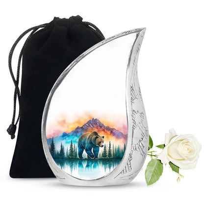 Gleaming Silver Bear Cremation Urn front view showing detailed design - flowing teardrop bear silhouette on curved aluminum - full-size 10 inch 200 cubic inch adult cremation urn