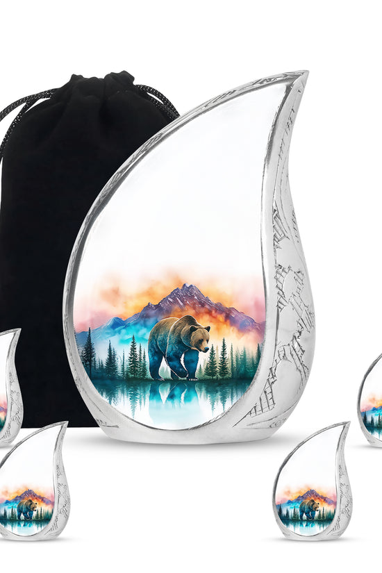 Chrome Silver Bear Cremation Urn side profile showing urn shape - graceful tear-shaped urn with bear motif - memorial set with one large and four small urns