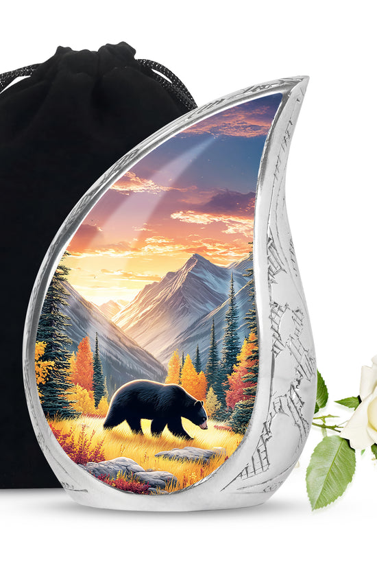 Antique Gold Bear Cremation Urn front view showing detailed design - flowing teardrop bear silhouette on curved aluminum - full-size 10 inch 200 cubic inch adult cremation urn