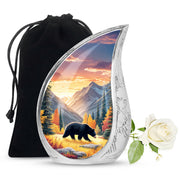 Antique Gold Bear Cremation Urn front view showing detailed design - flowing teardrop bear silhouette on curved aluminum - full-size 10 inch 200 cubic inch adult cremation urn