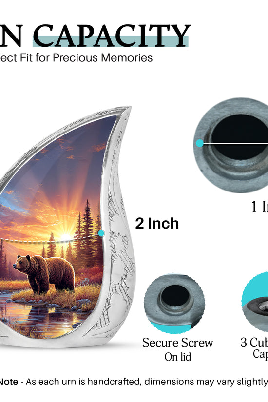 Burgundy Red Bear Cremation Urn angled view of lid and engraved motif - flowing teardrop bear silhouette on curved aluminum - mini keepsake memorial for portion of cremation ashes