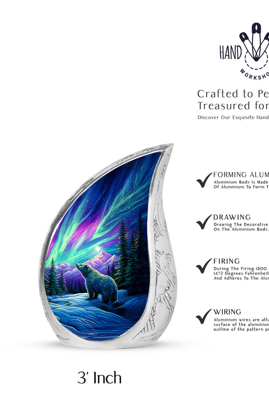 Misty Blue Bear Cremation Urn angled view of lid and engraved motif - rounded teardrop bear design with delicate detail - mini keepsake memorial for portion of cremation ashes