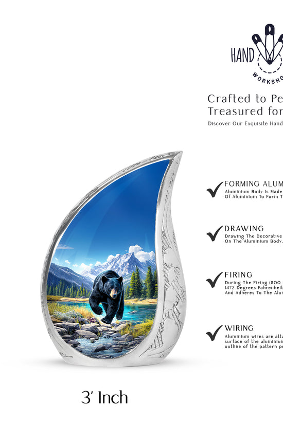 Cornflower Blue Bear Cremation Urn angled view of lid and engraved motif - smooth teardrop contour featuring bear art - mini keepsake memorial for portion of cremation ashes