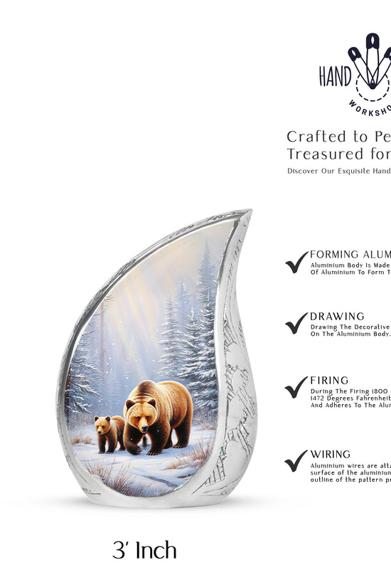 Frosted Silver Bear Cremation Urn angled view of lid and engraved motif - graceful tear-shaped urn with bear motif - mini keepsake memorial for portion of cremation ashes