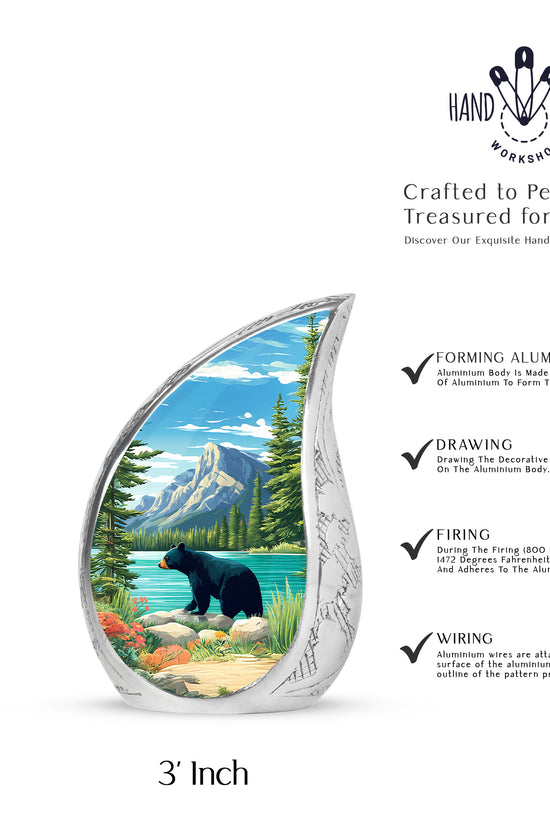 Bright Blue Bear Cremation Urn angled view of lid and engraved motif - smooth teardrop contour featuring bear art - mini keepsake memorial for portion of cremation ashes