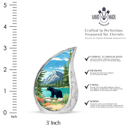 Bright Blue Bear Cremation Urn angled view of lid and engraved motif - smooth teardrop contour featuring bear art - mini keepsake memorial for portion of cremation ashes