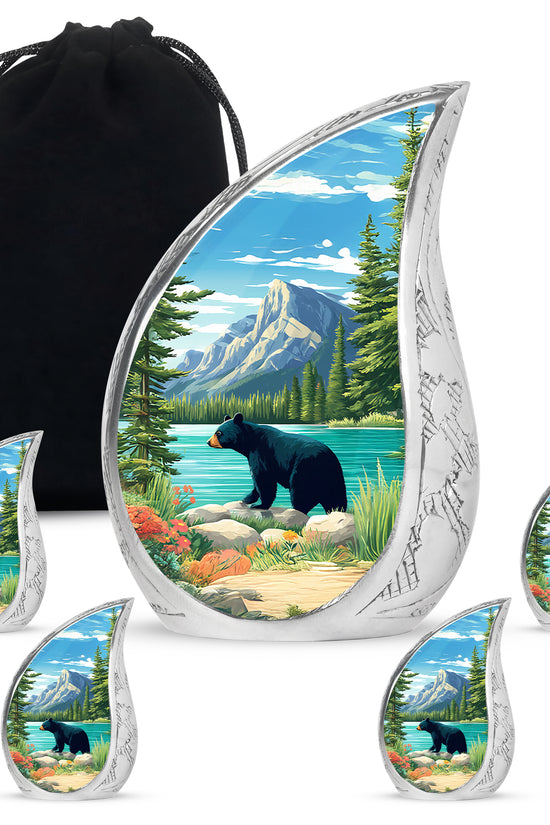 Misty Blue Bear Cremation Urn side profile showing urn shape - flowing teardrop bear silhouette on curved aluminum - memorial set with one large and four small urns