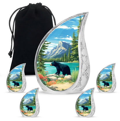 Misty Blue Bear Cremation Urn side profile showing urn shape - flowing teardrop bear silhouette on curved aluminum - memorial set with one large and four small urns