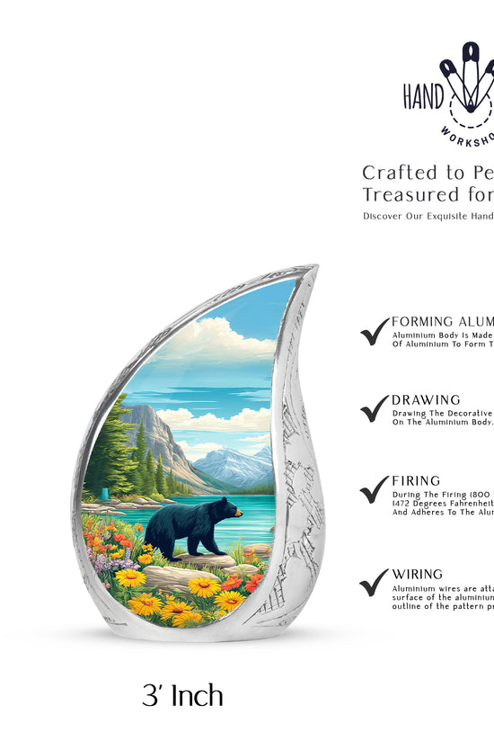 Tropical Teal Bear Cremation Urn angled view of lid and engraved motif - graceful tear-shaped urn with bear motif - mini keepsake memorial for portion of cremation ashes