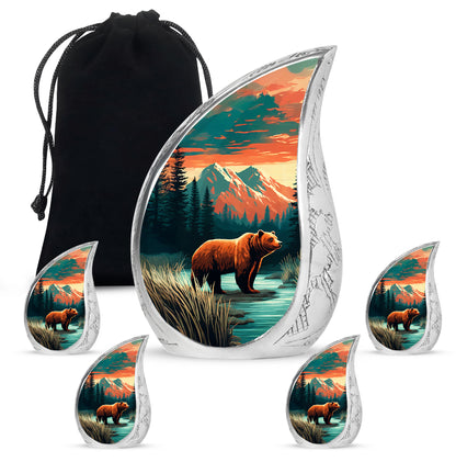 Soft Teal Bear Cremation Urn side profile showing urn shape - flowing teardrop bear silhouette on curved aluminum - memorial set with one large and four small urns