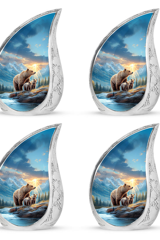 Icy Blue Bear Cremation Urn close-up of engraving and surface detail - flowing teardrop bear silhouette on curved aluminum - 10 inch aluminum urn for cremated remains