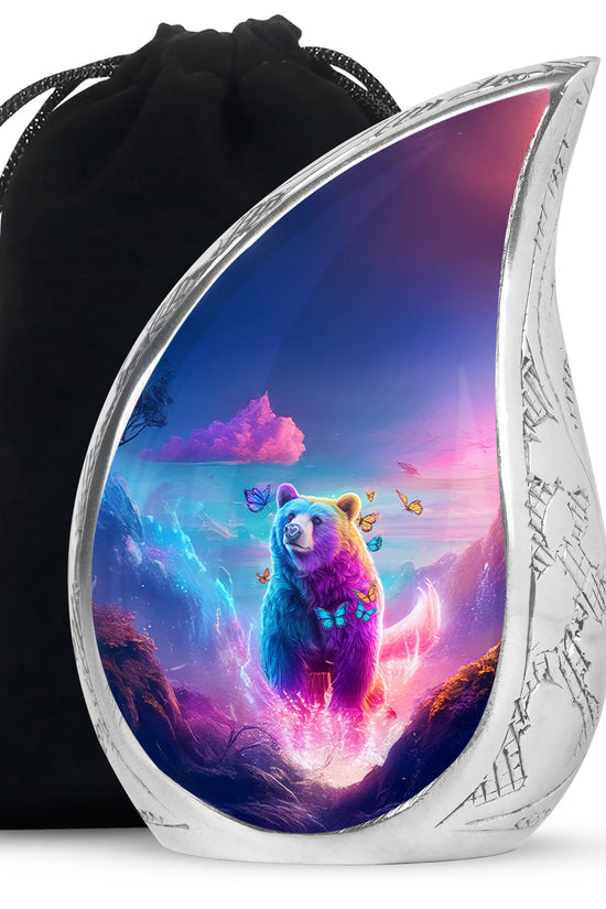 Misty Blue Bear Cremation Urn front view showing detailed design - flowing teardrop bear silhouette on curved aluminum - full-size 10 inch 200 cubic inch adult cremation urn