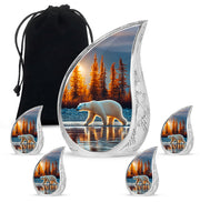 Azure Bear Cremation Urn side profile showing urn shape - rounded teardrop bear design with delicate detail - memorial set with one large and four small urns