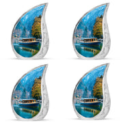 Dusty Blue Boat Cremation Urn close-up of engraving and surface detail - rounded teardrop boat design with delicate detail - 10 inch aluminum urn for cremated remains