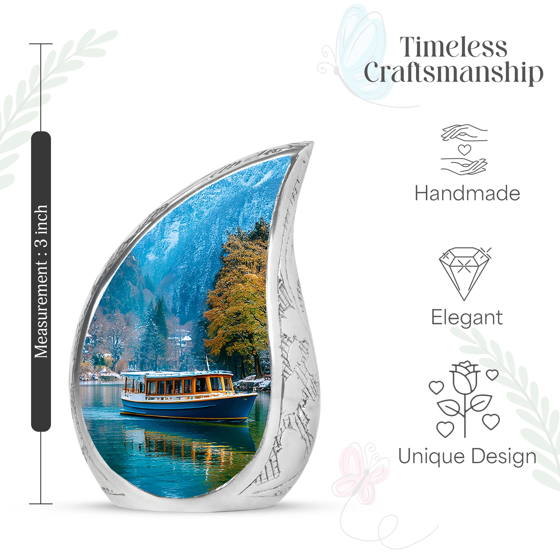 Serene Blue Boat Cremation Urn angled view of lid and engraved motif - smooth teardrop contour featuring boat art - mini keepsake memorial for portion of cremation ashes