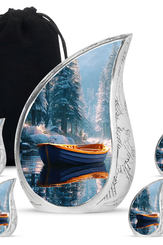 Vivid Teal Boat Cremation Urn side profile showing urn shape - graceful tear-shaped urn with boat motif - memorial set with one large and four small urns