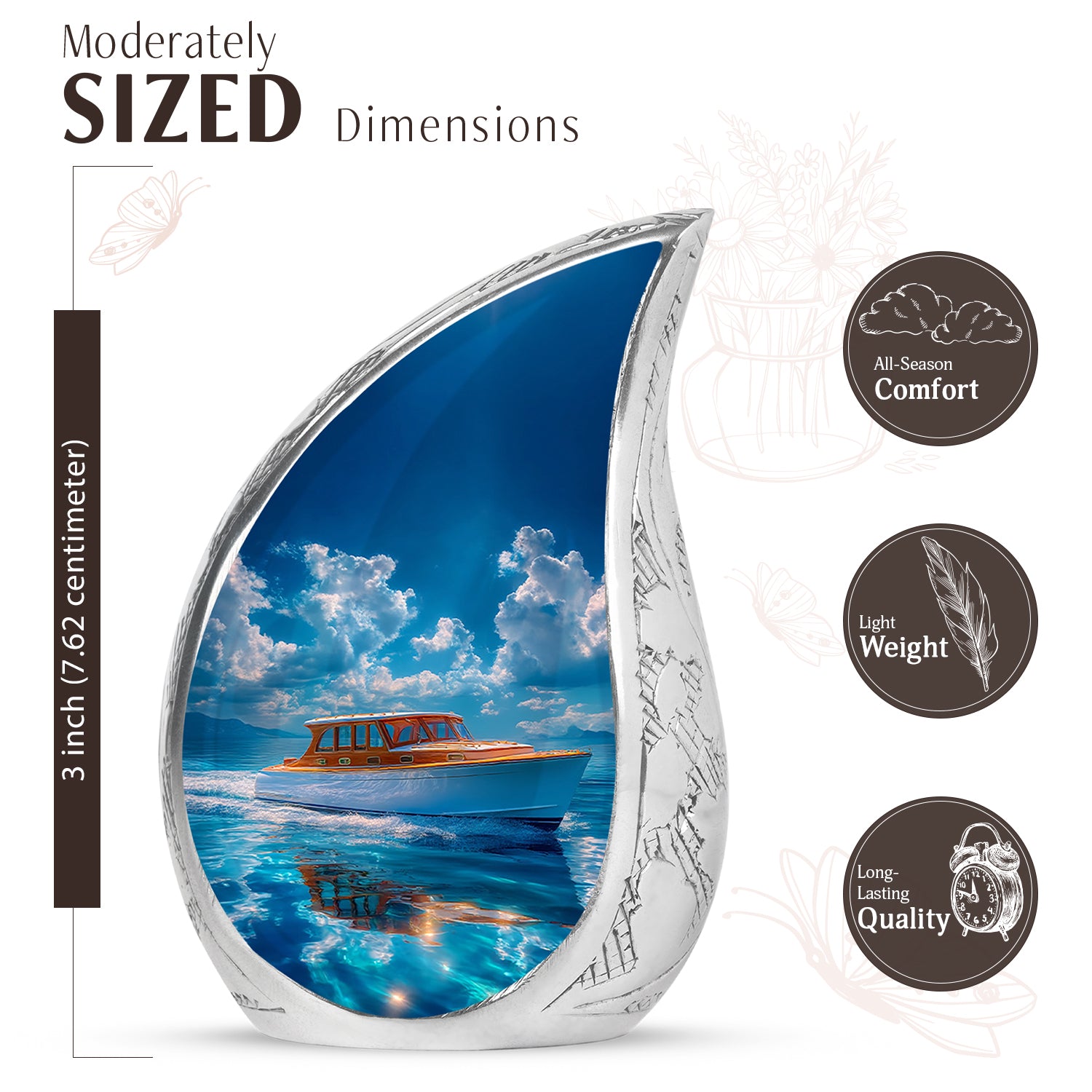 Cobalt Blue Boat Cremation Urn angled view of lid and engraved motif - graceful tear-shaped urn with boat motif - mini keepsake memorial for portion of cremation ashes