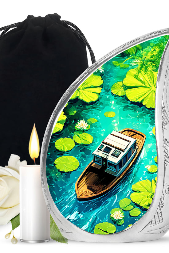 Powder Blue Boat Cremation Urn front view showing detailed design - flowing teardrop boat silhouette on curved aluminum - full-size 10 inch 200 cubic inch adult cremation urn