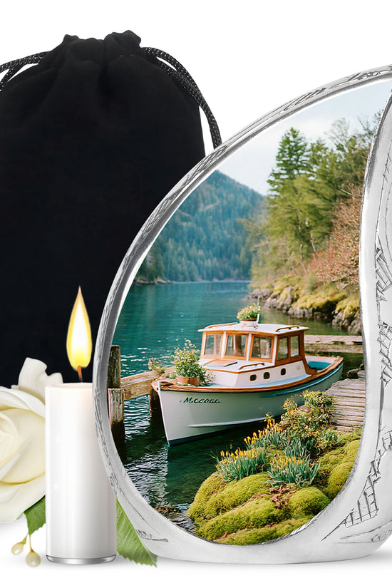 Tropical Teal Boat Cremation Urn front view showing detailed design - graceful tear-shaped urn with boat motif - full-size 10 inch 200 cubic inch adult cremation urn