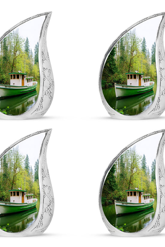 Emerald Green Boat Cremation Urn close-up of engraving and surface detail - rounded teardrop boat design with delicate detail - 10 inch aluminum urn for cremated remains
