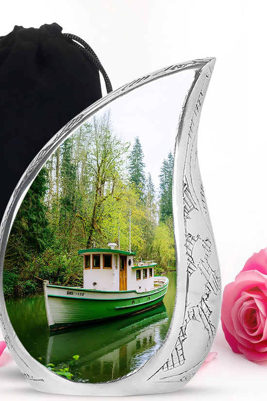 Jade Green Boat Cremation Urn front view showing detailed design - rounded teardrop boat design with delicate detail - full-size 10 inch 200 cubic inch adult cremation urn