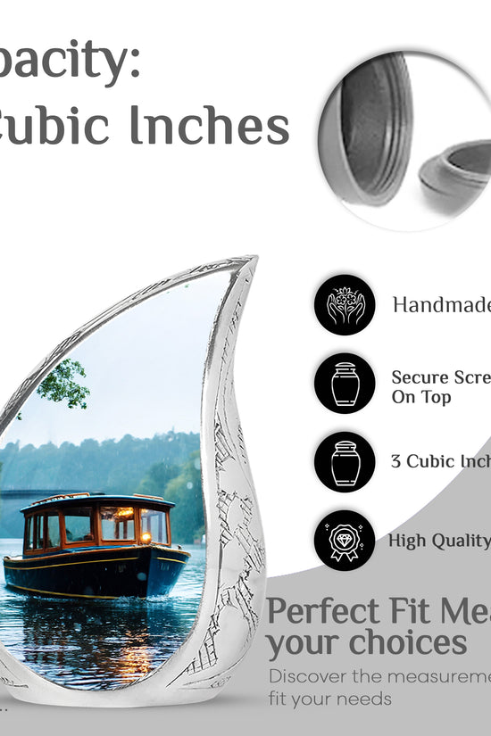 Silk White Boat Cremation Urn angled view of lid and engraved motif - graceful tear-shaped urn with boat motif - mini keepsake memorial for portion of cremation ashes