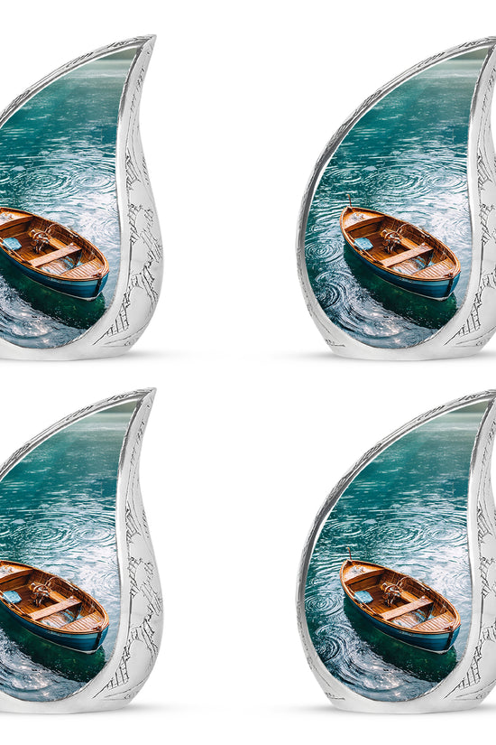 Cool Teal Boat Cremation Urn close-up of engraving and surface detail - flowing teardrop boat silhouette on curved aluminum - 10 inch aluminum urn for cremated remains