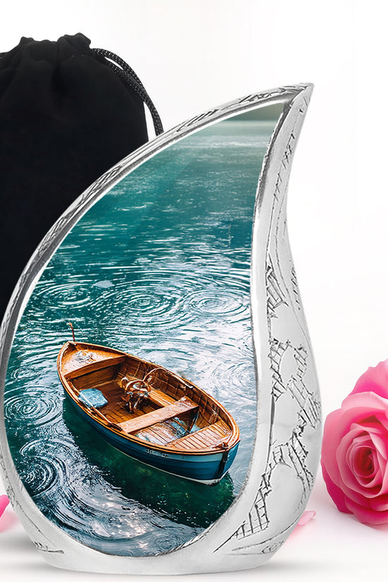 Deep Teal Boat Cremation Urn front view showing detailed design - graceful tear-shaped urn with boat motif - full-size 10 inch 200 cubic inch adult cremation urn