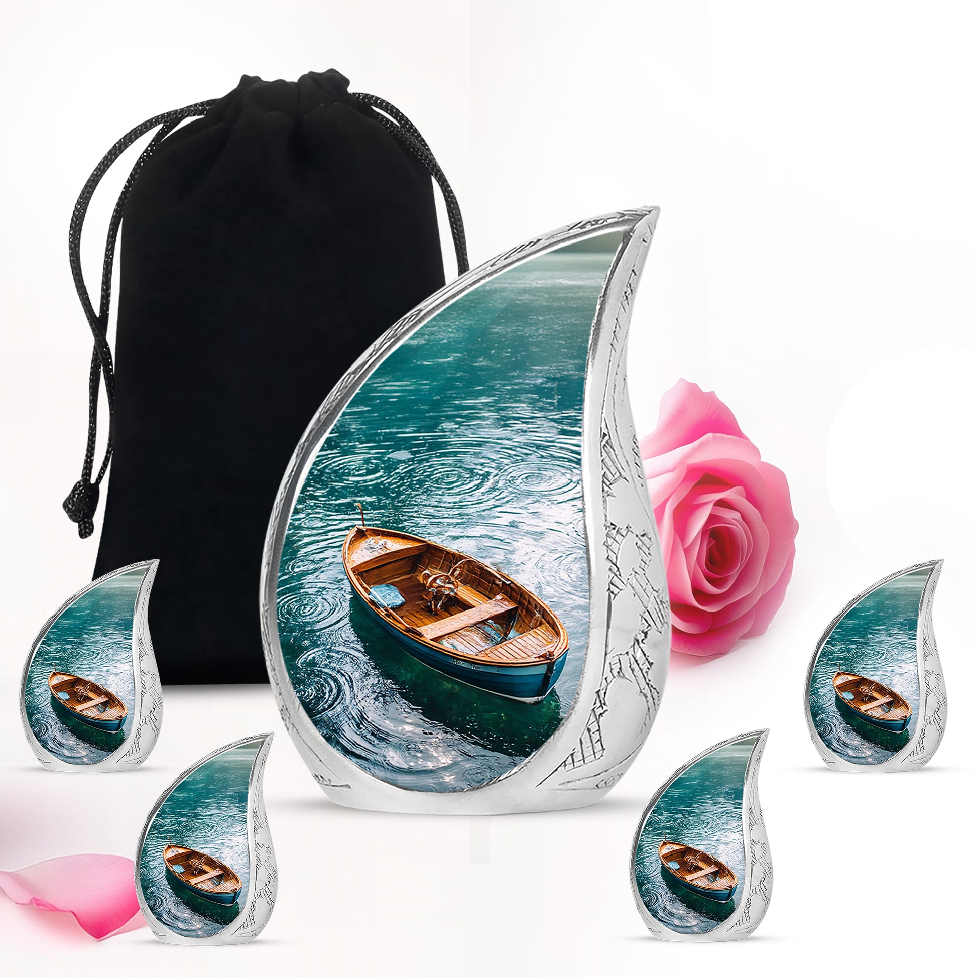 Deep Teal Boat Cremation Urn side profile showing urn shape - smooth teardrop contour featuring boat art - memorial set with one large and four small urns