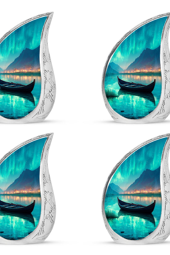 Deep Teal Boat Cremation Urn close-up of engraving and surface detail - smooth teardrop contour featuring boat art - 10 inch aluminum urn for cremated remains