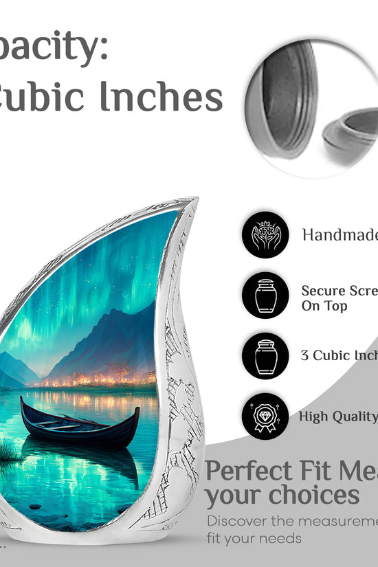 Aqua Teal Boat Cremation Urn angled view of lid and engraved motif - smooth teardrop contour featuring boat art - mini keepsake memorial for portion of cremation ashes