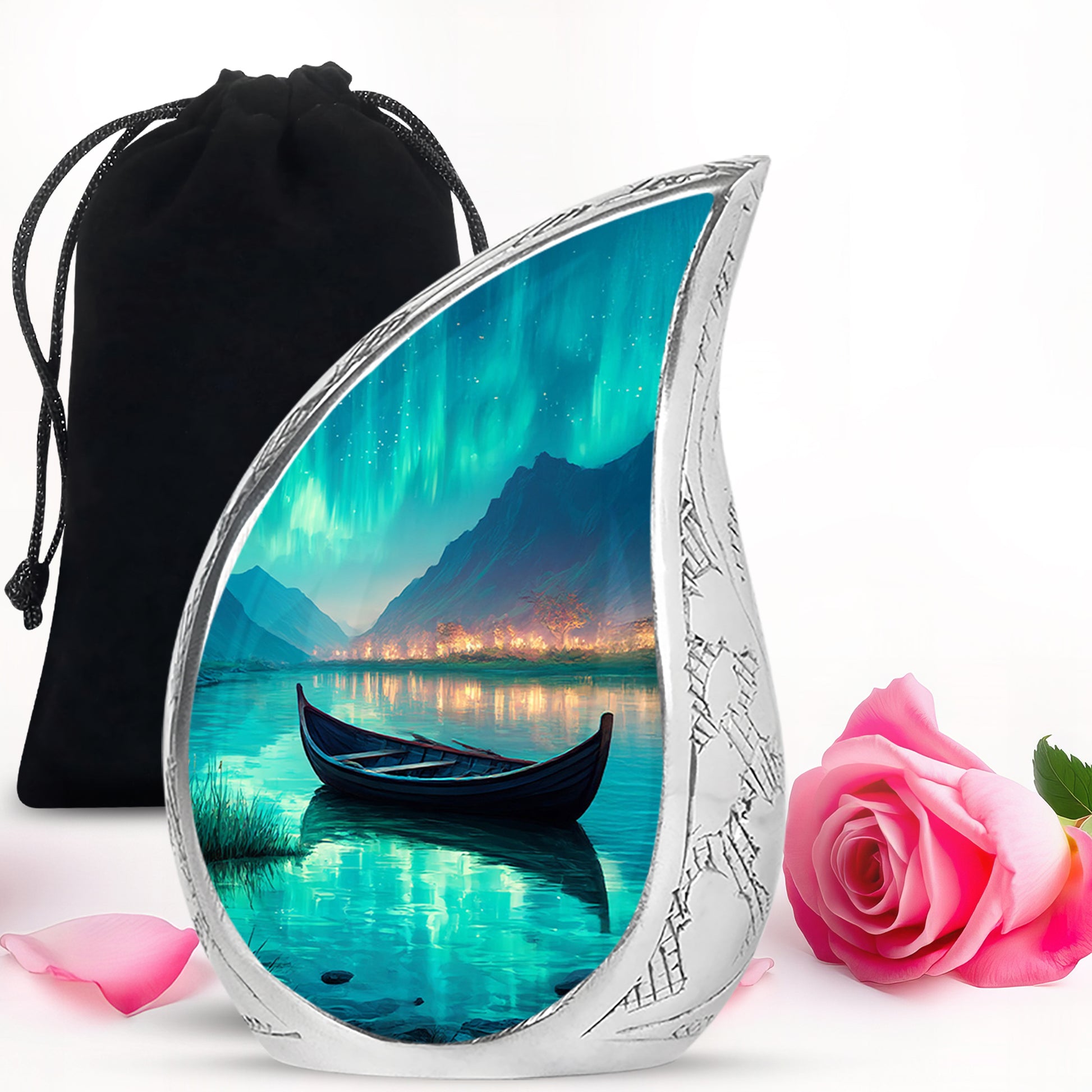 Ocean Teal Boat Cremation Urn front view showing detailed design - flowing teardrop boat silhouette on curved aluminum - full-size 10 inch 200 cubic inch adult cremation urn