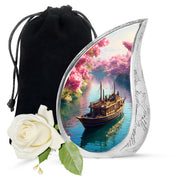 Soft Pink Boat Cremation Urn front view showing detailed design - smooth teardrop contour featuring boat art - full-size 10 inch 200 cubic inch adult cremation urn