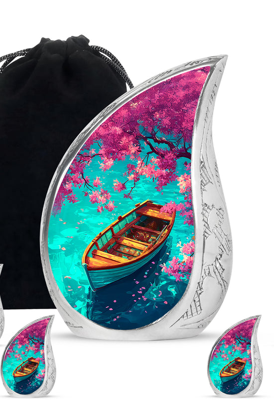 Cool Teal Boat Cremation Urn side profile showing urn shape - flowing teardrop boat silhouette on curved aluminum - memorial set with one large and four small urns