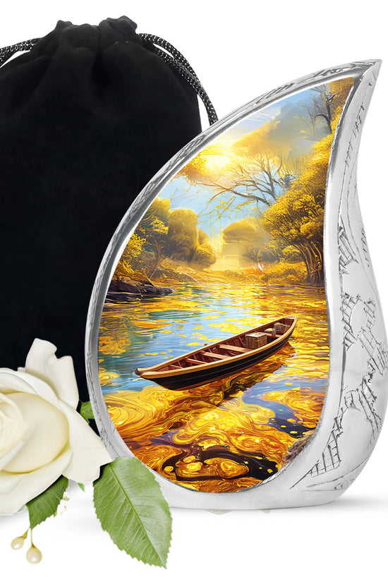 Sunrise Gold Boat Cremation Urn front view showing detailed design - rounded teardrop boat design with delicate detail - full-size 10 inch 200 cubic inch adult cremation urn